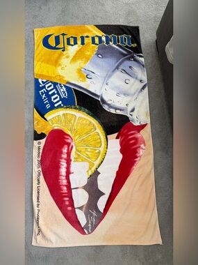 Almost vintage Corona beach towel with graphics by Michael Searle